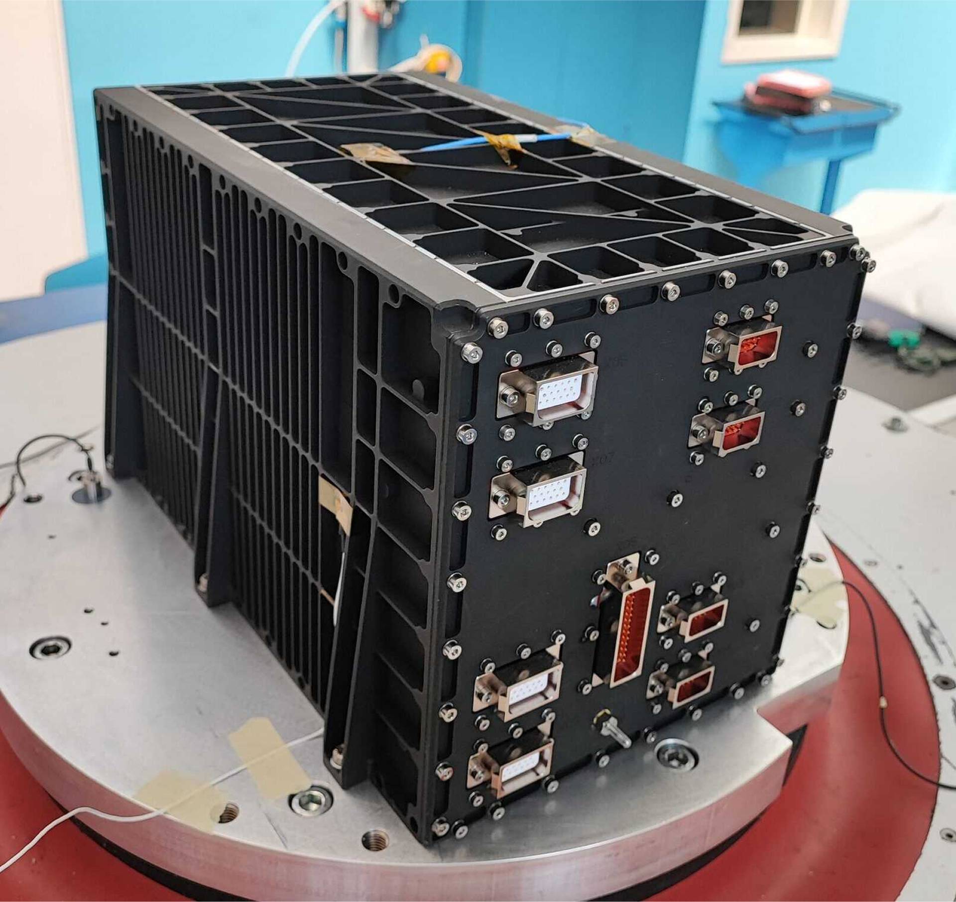 EFD-02 Electronic Box (EEB) undergoing vibration testing at SERMS